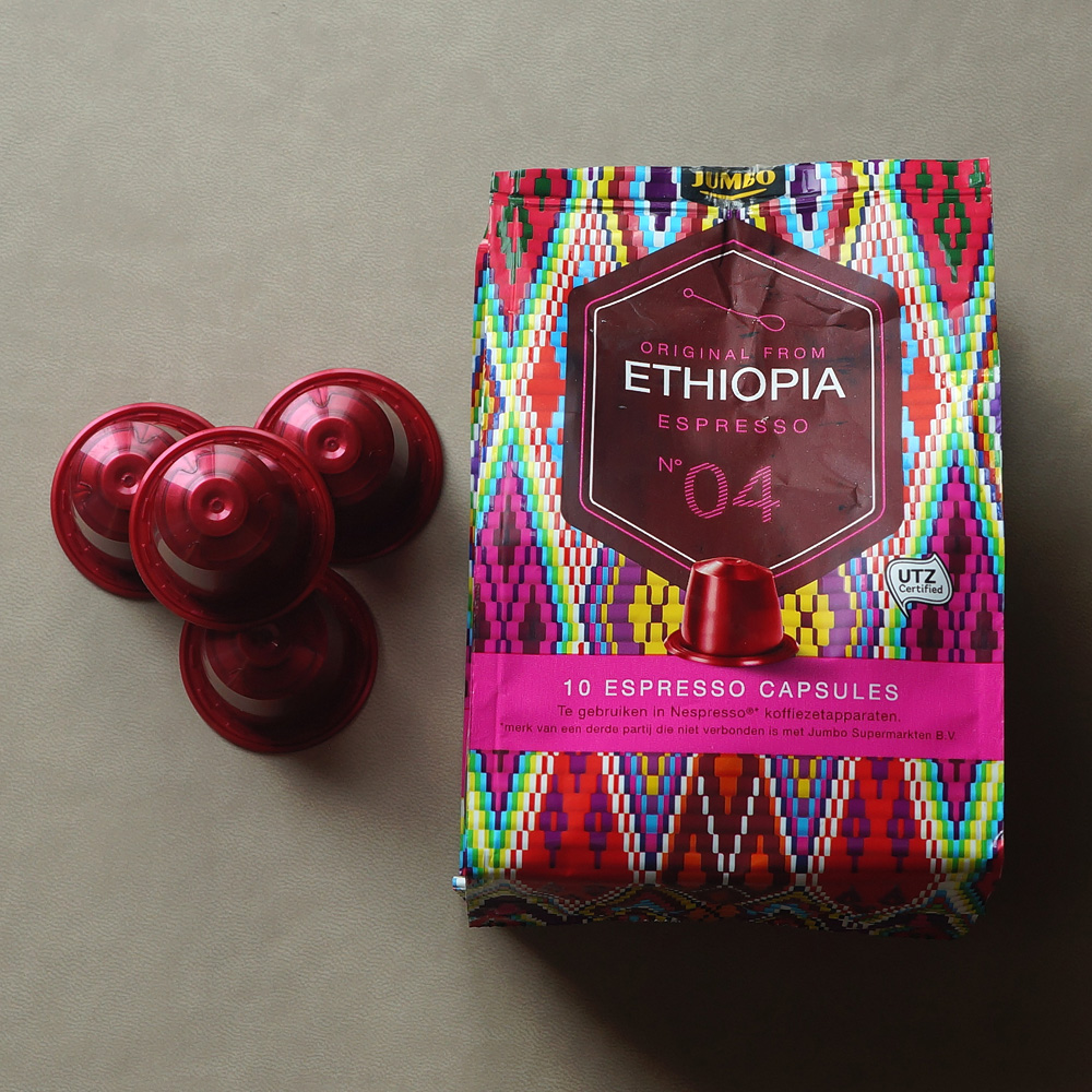 Ethiopia by Jumbo - dark red capsules with colourful packaging bag on a grey background