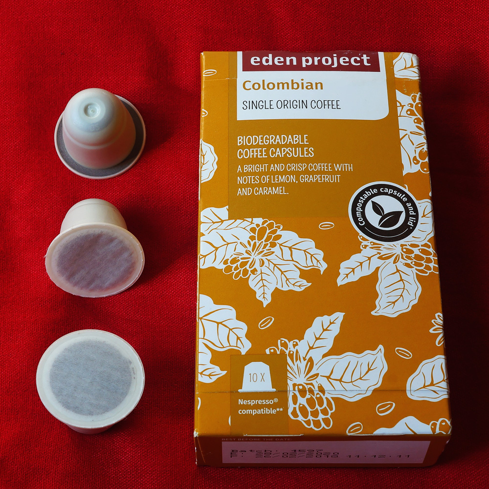 Colombian by Eden Project - three biodegradable coffee capsule with bright orange box on a red background
