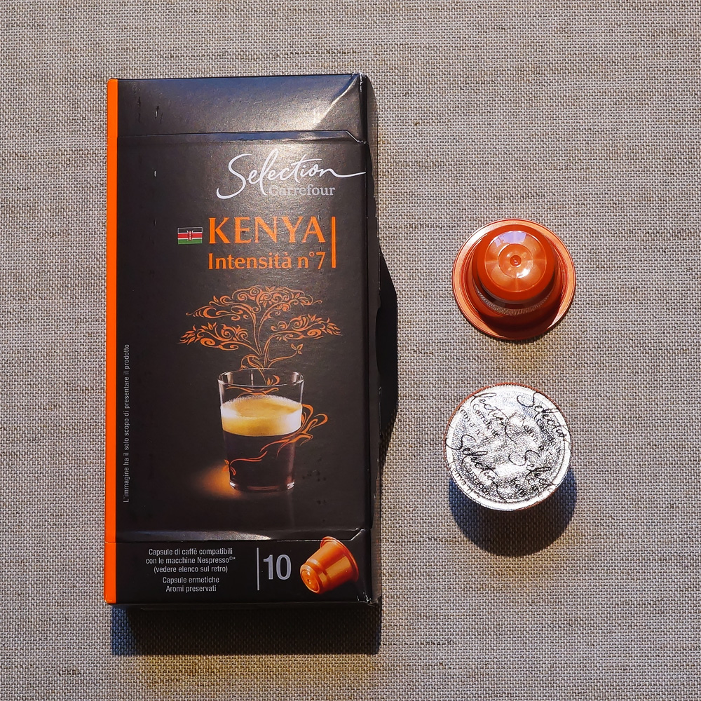 Kenya by Carrefour - two orange coffee capsules with dark packaging box