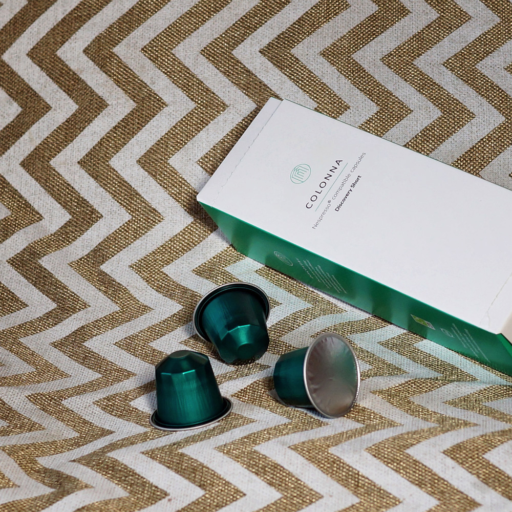 Colonna Coffee capsule box with green coffee pods